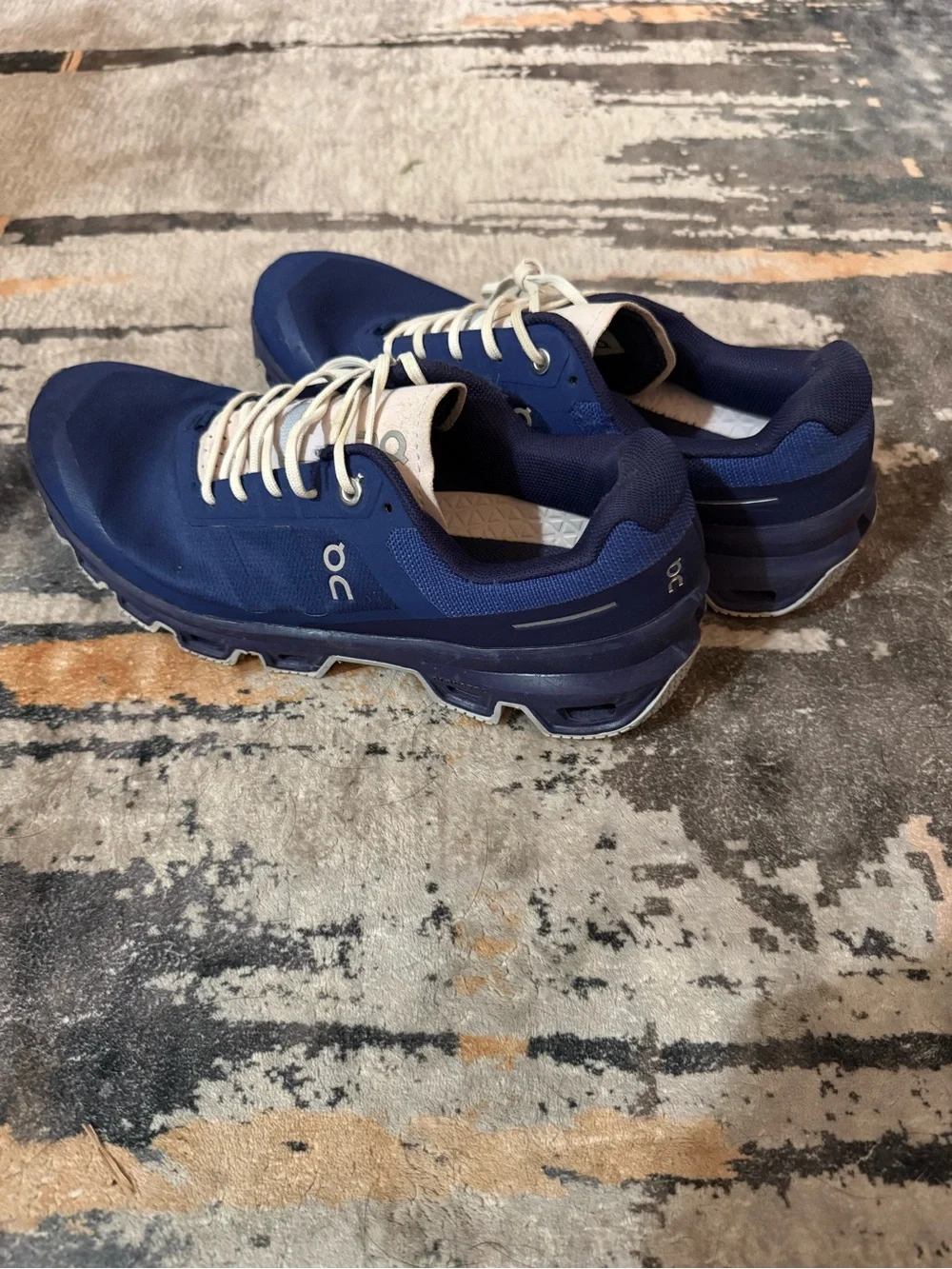 On Running Women’s Cloudrunner Athletic Shoes in Navy and Cream